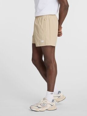 New Balance Tan Athletic Shorts with White Logo